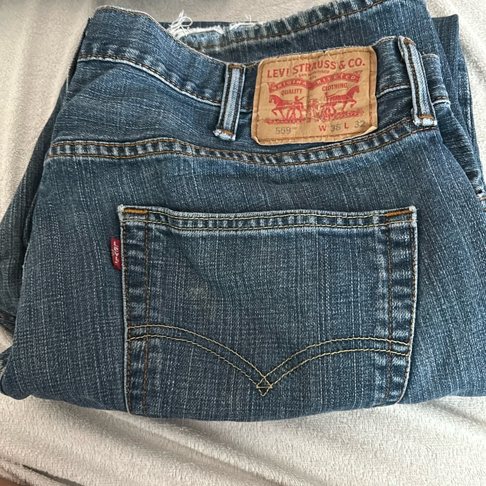 Used pair of Levis-  some fray that adds character!
